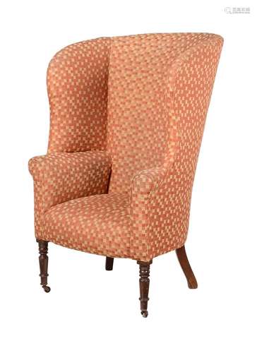 A MAHOGANY AND UPHOLSTERED BARREL BACK ARMCHAIR