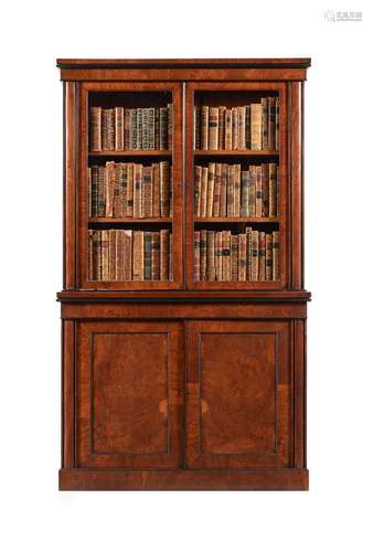 AN UNUSUAL REGENCY POLLARD OAK AND EBONISED BOOKCASE CABINET