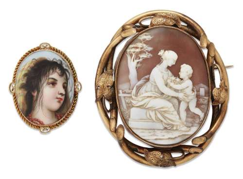 Two brooches, one a Victorian gold mounted shell cameo brooc...