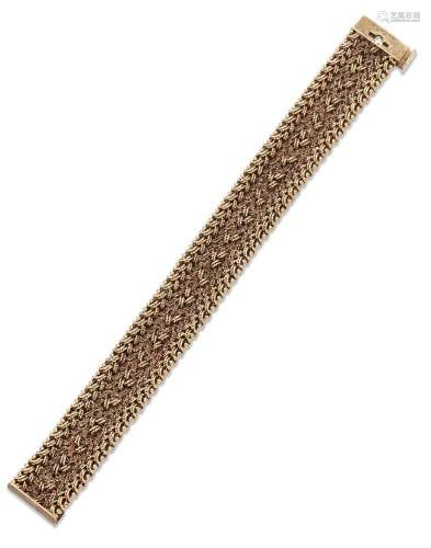 A 9ct gold flexible bracelet, of fancy broad meshwork design...