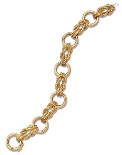 Hermes, a gold bracelet, by Hermes, of rope work and annular...