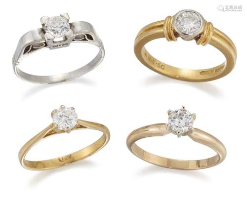 Four diamond single stone rings, including an 18ct gold diam...