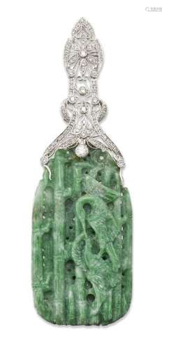 A jadeite jade and diamond pendant, the jade panel carved to...