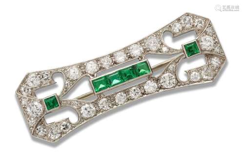 A diamond and emerald panel brooch, the pierced rectangular ...