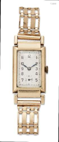 A 9ct gold wristwatch, the rectangular silvered dial with Ar...