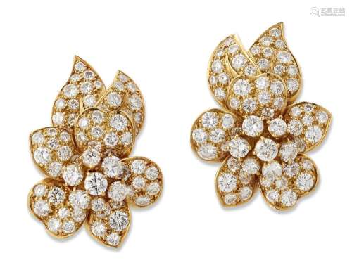 A pair of 18ct gold, diamond earrings, of floral design set ...