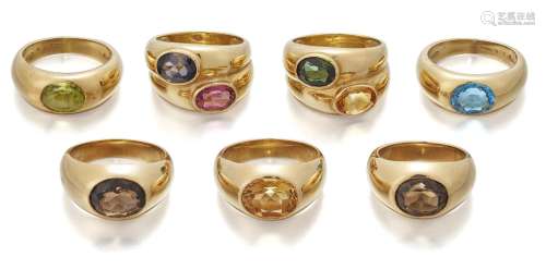 A group of seven gem-set rings, comprising: three rings by D...