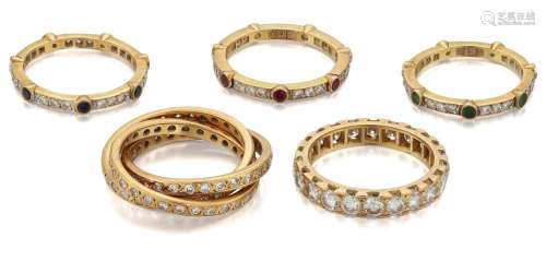 Five various diamond and gem eternity rings, comprising: a d...