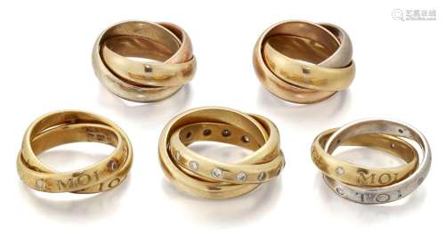 Five gold rings, comprising: Three triple band rings, one ac...