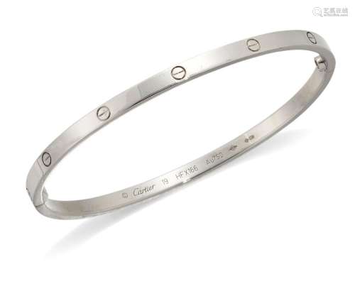 Cartier, an 18ct white gold 'Love', bangle, by Cartier, sign...