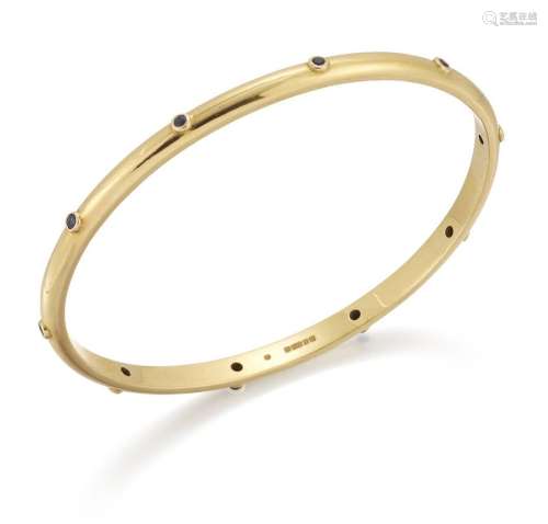 Theo Fennell, a gold and sapphire bangle, by Theo Fennell ac...