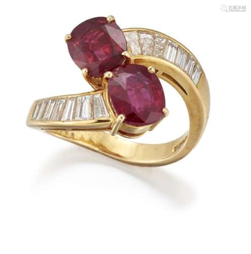 A ruby and diamond ring, crossover design, set with two oval...