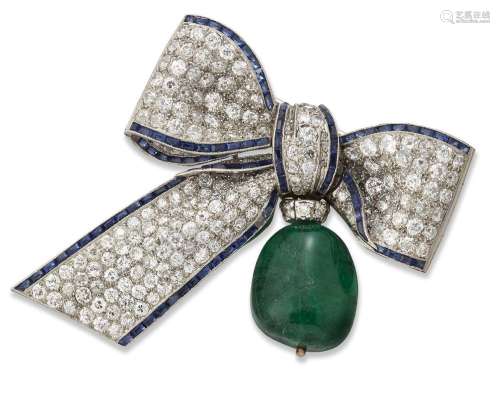 An emerald, diamond and sapphire brooch, designed as a ribbo...