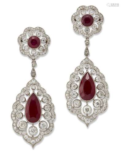 A pair of platinum, ruby and diamond pendent earrings, each ...