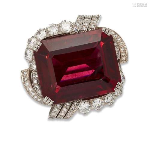 A rubellite and diamond brooch, centring on a cut-cornered r...