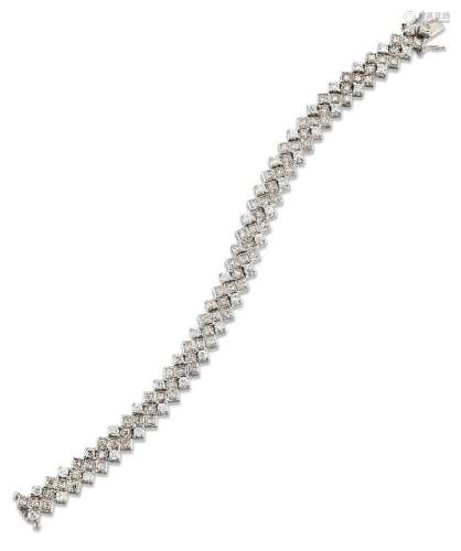 A diamond flexible bracelet, composed of diamond articulated...