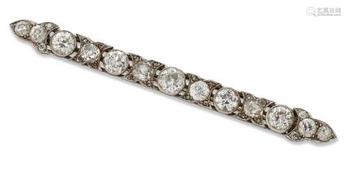A diamond bar brooch, composed of a principal line of collet...