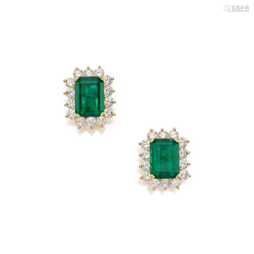 Pair of Emerald and Diamond Earclips . Pair of Emerald and D...