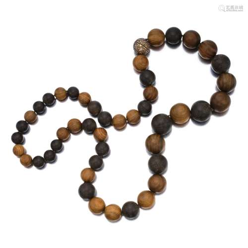 Hemmerle . Wood, Amber and Colored Diamond Necklace.