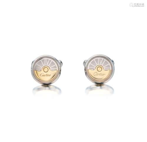 Cartier . Pair of Silver and Gold 'Oscillating Weight' Cuffl...