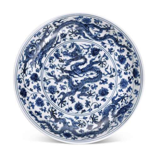 A blue and white 'dragon' dish, Mark and period of Zhengde |...