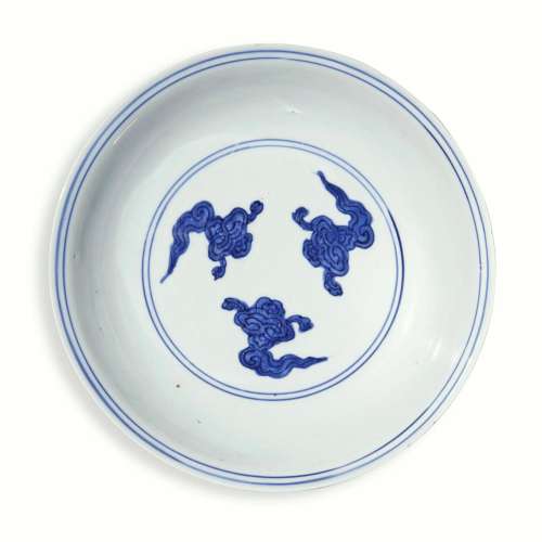 A blue and white 'tri-cloud' dish, Mark and period of Wanli ...