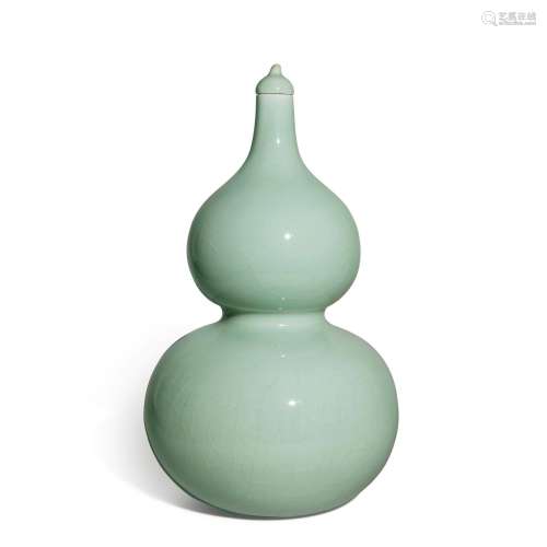 A rare celadon-glazed double-gourd vase and cover, Seal mark...