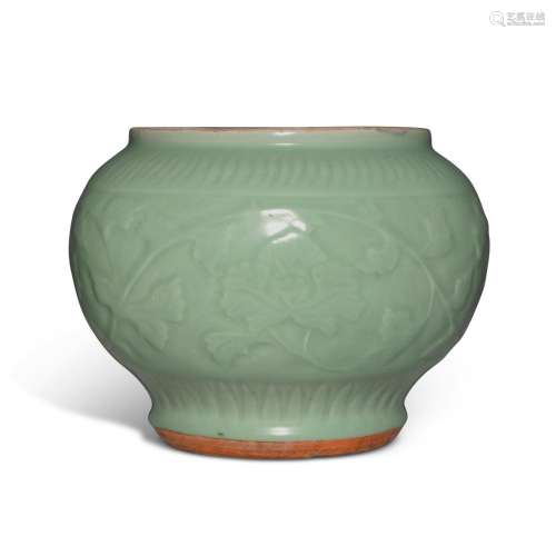 A carved 'Longquan' celadon-glazed 'floral' jar, Yuan dynast...