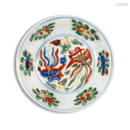 A small wucai 'phoenix' dish, Mark and period of Wanli | 明萬...