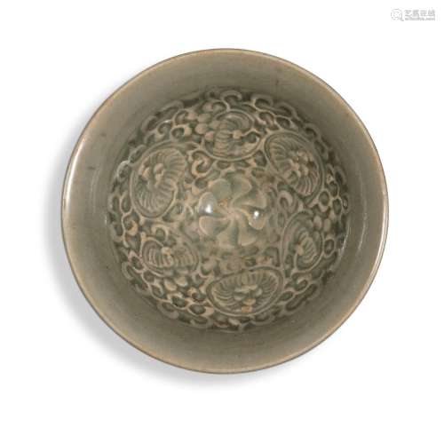 A molded 'Yaozhou' 'floral' bowl, Northern Song / Jin dynast...