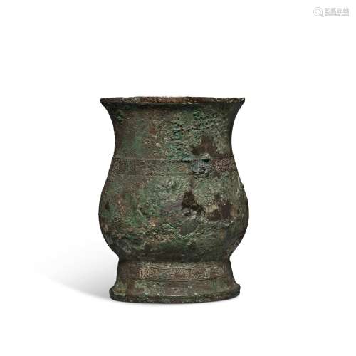 An inscribed archaic bronze ritual wine vessel (Zhi), Early ...