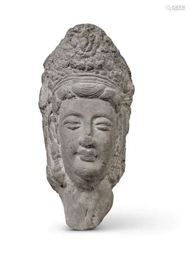A carved limestone head of a bodhisattva, Northern Wei dynas...