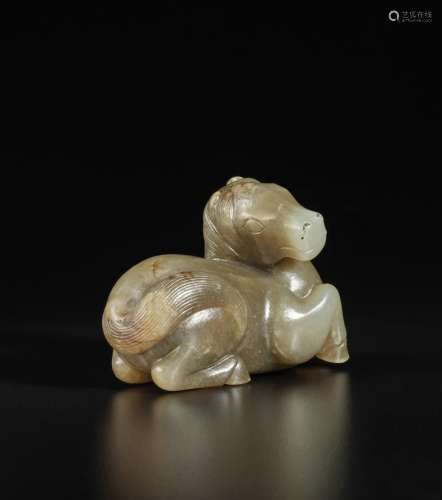 A celadon and brown jade carving of a horse, Song - Ming dyn...