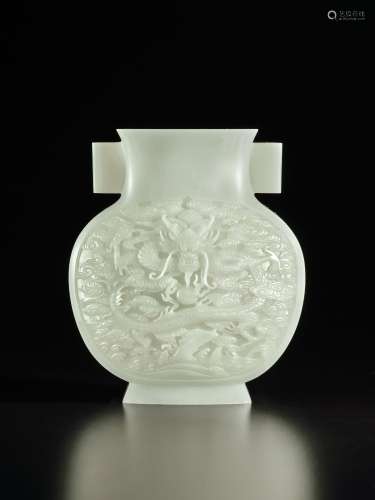 A superbly carved white jade 'dragon' vase, Qing dynasty, Qi...