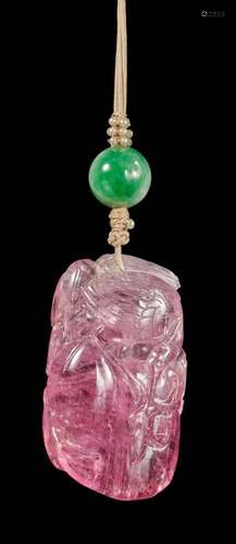 A tourmaline 'crane and peach' pendant, Qing dynasty, 19th c...