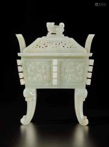 An archaistic pale celadon jade censer and cover (Fang ding)...