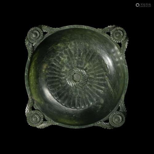 A Mughal-style spinach-green jade 'chrysanthemum' bowl, Qing...
