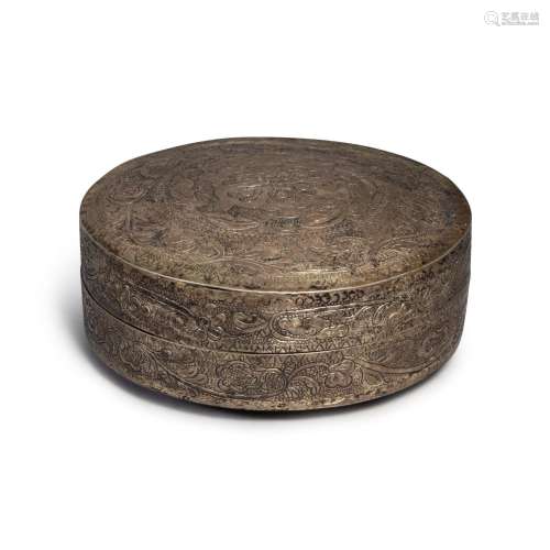 A copper alloy 'floral' circular box and cover, Tang dynasty...