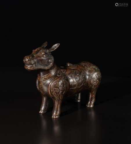 An archaistic silver-inlaid bronze figure of a tapir, Ming d...
