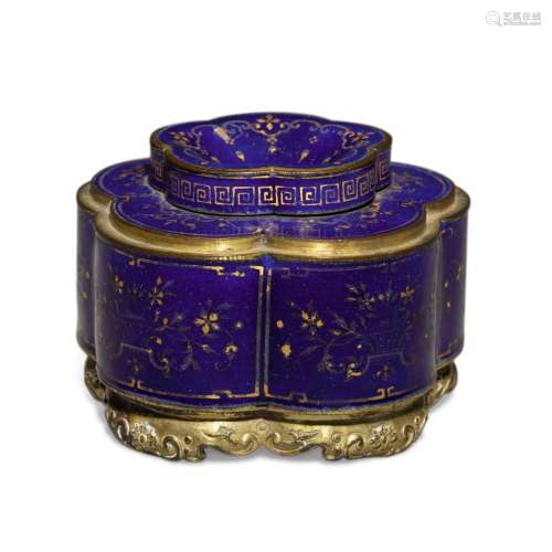 A gilt-decorated blue-ground enamel lobed inkwell and cover,...