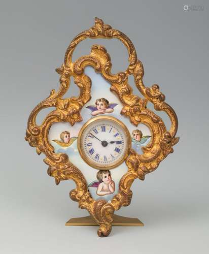 Table clock. Vienna. Late 19th century, Louis XV style. Gilt...