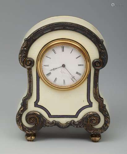 Enamelled and gilded silver travel clock. Early 20th century...