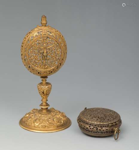 Clock stand. 17th century. Gilded bronze with crucified Chri...