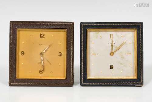 Set comprising two alarm clocks; 20th century.Lined wood.In ...