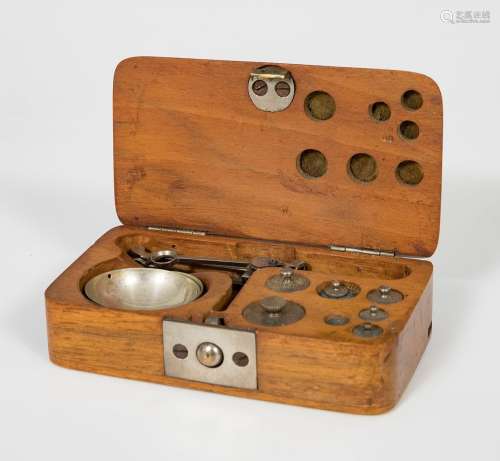 Scales; early 20th century:Carved wood and metal.Measurement...