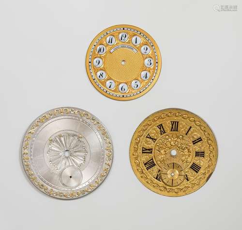 Set of three dials; mid-19th century.Gilt brass, silver and ...