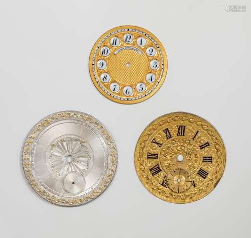 Set of three dials; mid-19th century.Gilt brass, silver and ...