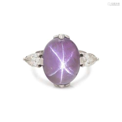 CARTIER, PURPLE COLOR CHANGE STAR SAPPHIRE AND DIAMOND RING