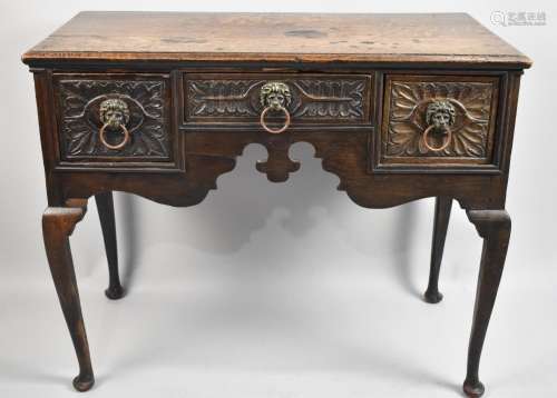 A 19th Century Oak Lowboy on Extended Cabriole Supports with...