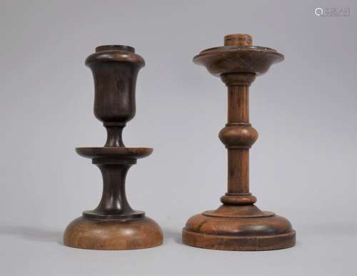 Two Treen Candlesticks, 14cms and 13cms High